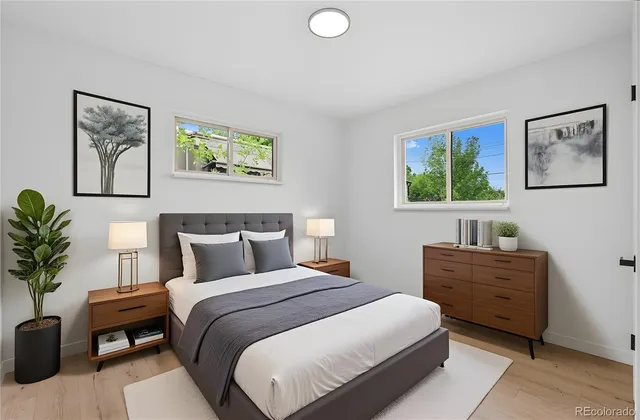 a bedroom with a bed and furniture