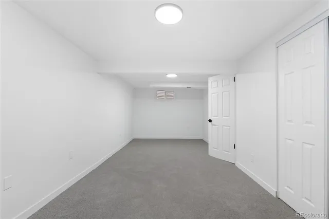 a bathroom with a sink toilet and mirror