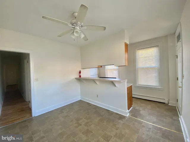 a view of storage and utility room with washer and dryer