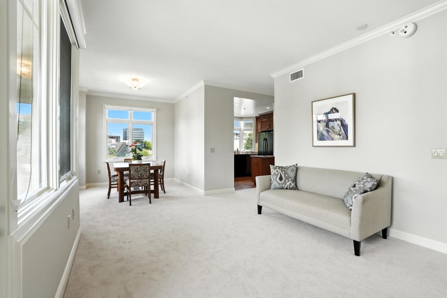 10 Crystal Springs Road, Unit 2414 San Mateo, CA 94402 - Photo 11 of 33 a living room with furniture and a large window