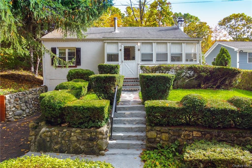 15 Van Cortlandt Place Cortlandt Manor, NY 10567 - Photo 1 of 1 a front view of a house with garden