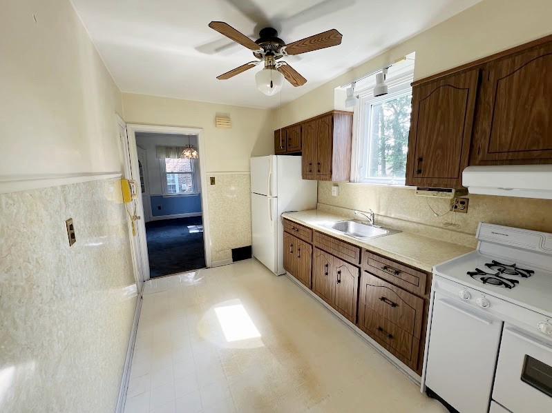 310 Edgemore Road Secane, PA 19018 - Photo 11 of 19 a kitchen with granite countertop a sink appliances cabinets and counter space