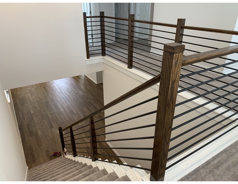 11715 Caithness Way Austin, TX 78653 - Photo 18 of 40 Stairway featuring hardwood / wood-style tile floors