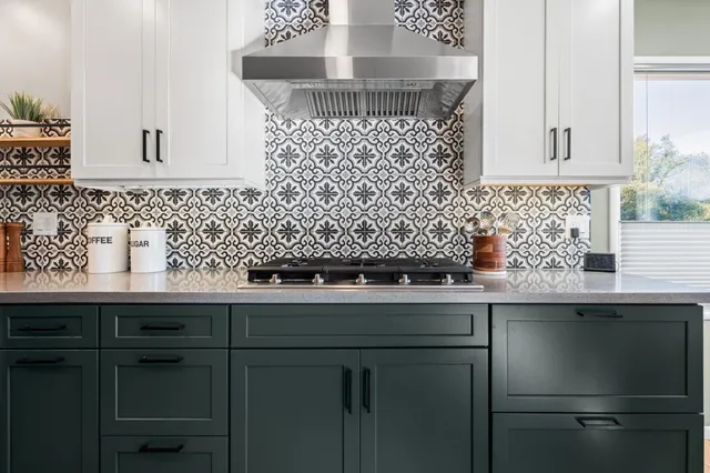 a kitchen with a sink and cabinets