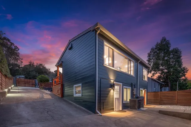 a view of a house with a street
