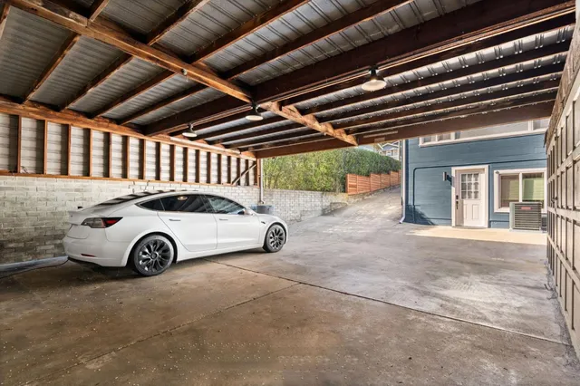 a car parked in front of a house