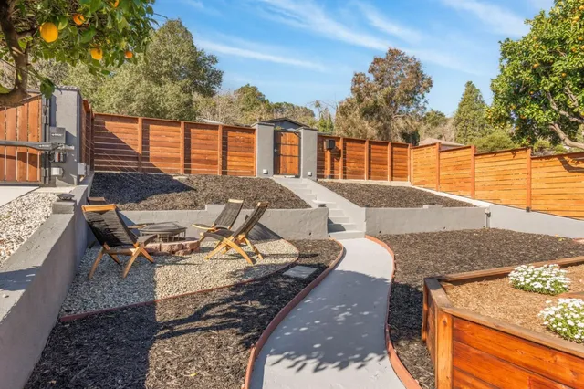 a view of a roof deck with couches