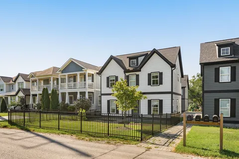 a front view of a house with a porch