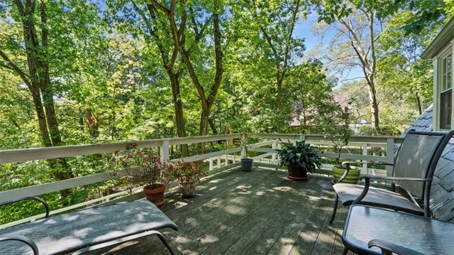 a view of backyard with seating space