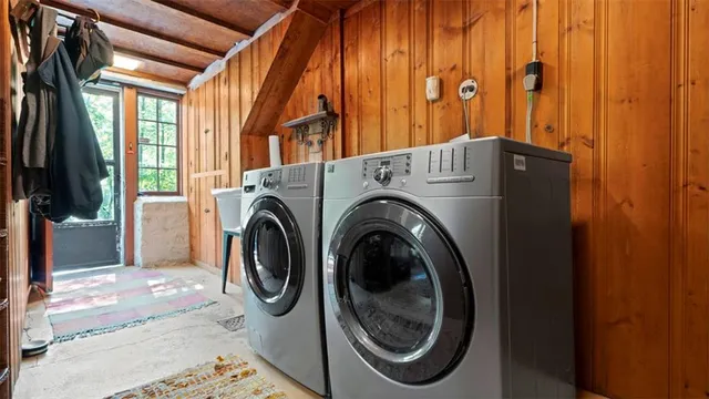 a front view of a building with outdoor seating