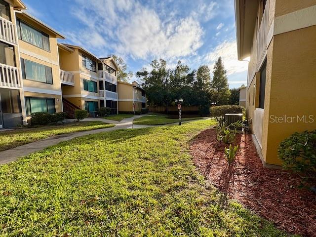 1550 South Belcher Road, Unit 211 Clearwater, FL 33764 - Photo 19 of 26 a view of a yard in front of a building