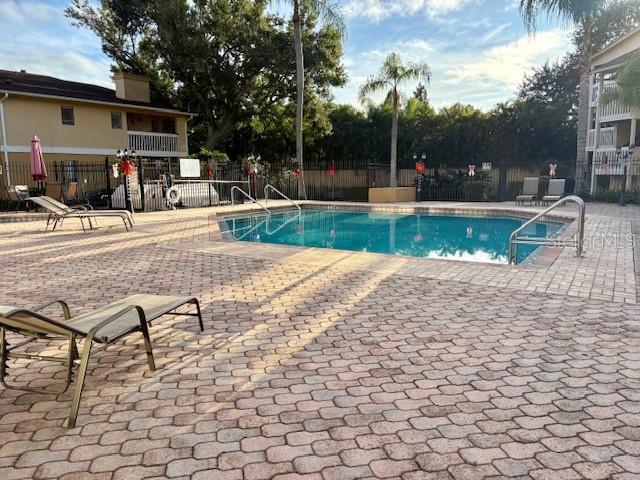 1550 South Belcher Road, Unit 211 Clearwater, FL 33764 - Photo 22 of 26 a view of a yard with plants and a fountain