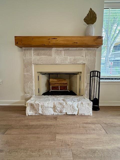 1550 South Belcher Road, Unit 211 Clearwater, FL 33764 - Photo 3 of 26 a living room with furniture fireplace and a window