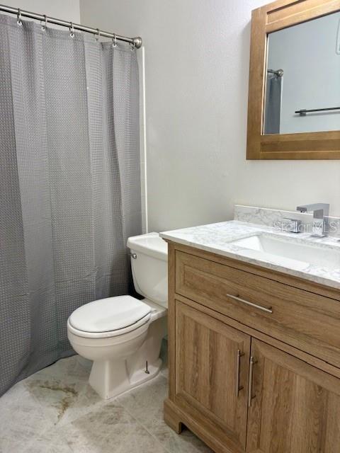 1550 South Belcher Road, Unit 211 Clearwater, FL 33764 - Photo 10 of 26 a bathroom with a sink and a toilet