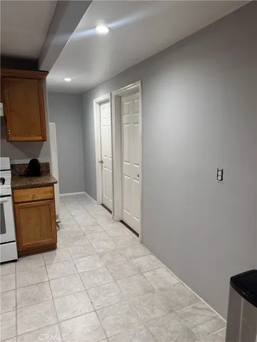 a view of a kitchen with a sink
