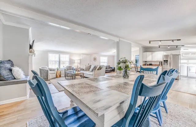 a view of a dining room and livingroom view