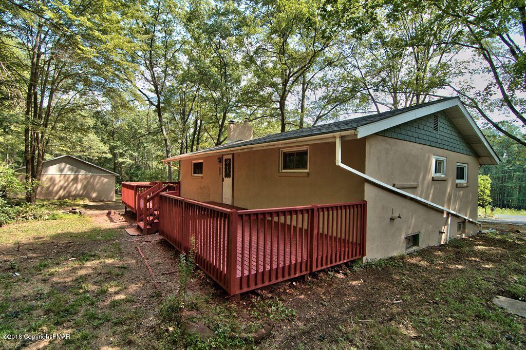 1103 Cameron Road Effort, PA 18330 - Photo 35 of 40 a view of a house with a yard and deck area