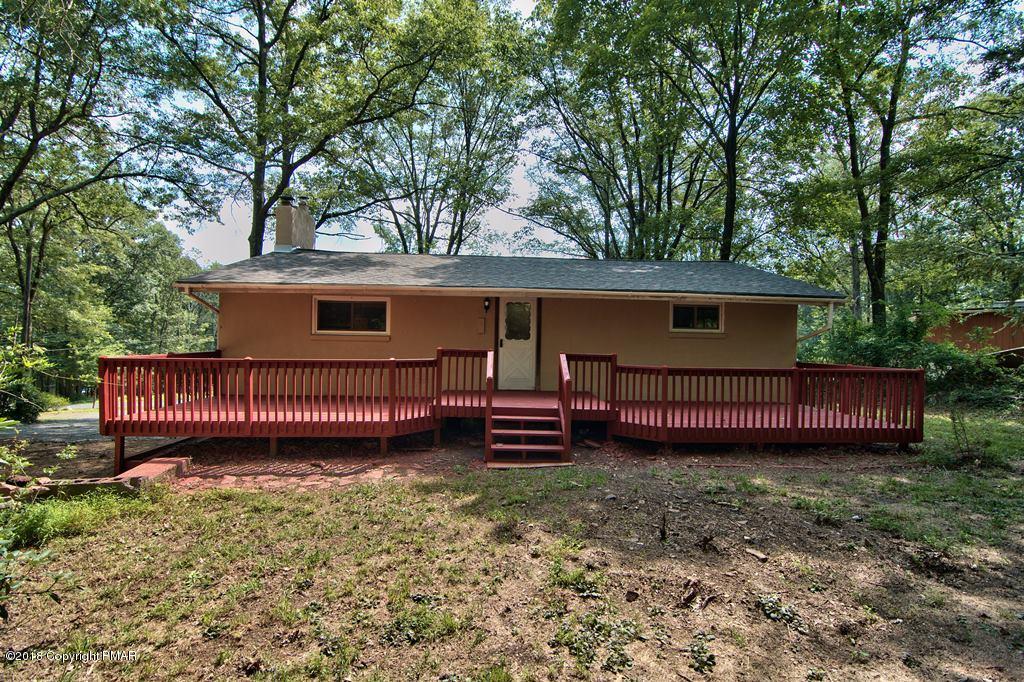 1103 Cameron Road Effort, PA 18330 - Photo 5 of 40 front view of a house with a yard and deck