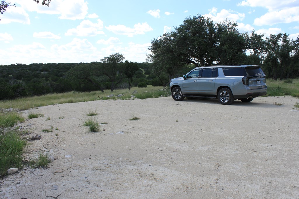 0 Dominion Road Rocksprings, TX 78880 - Photo 12 of 27 a view of a car parked in a field