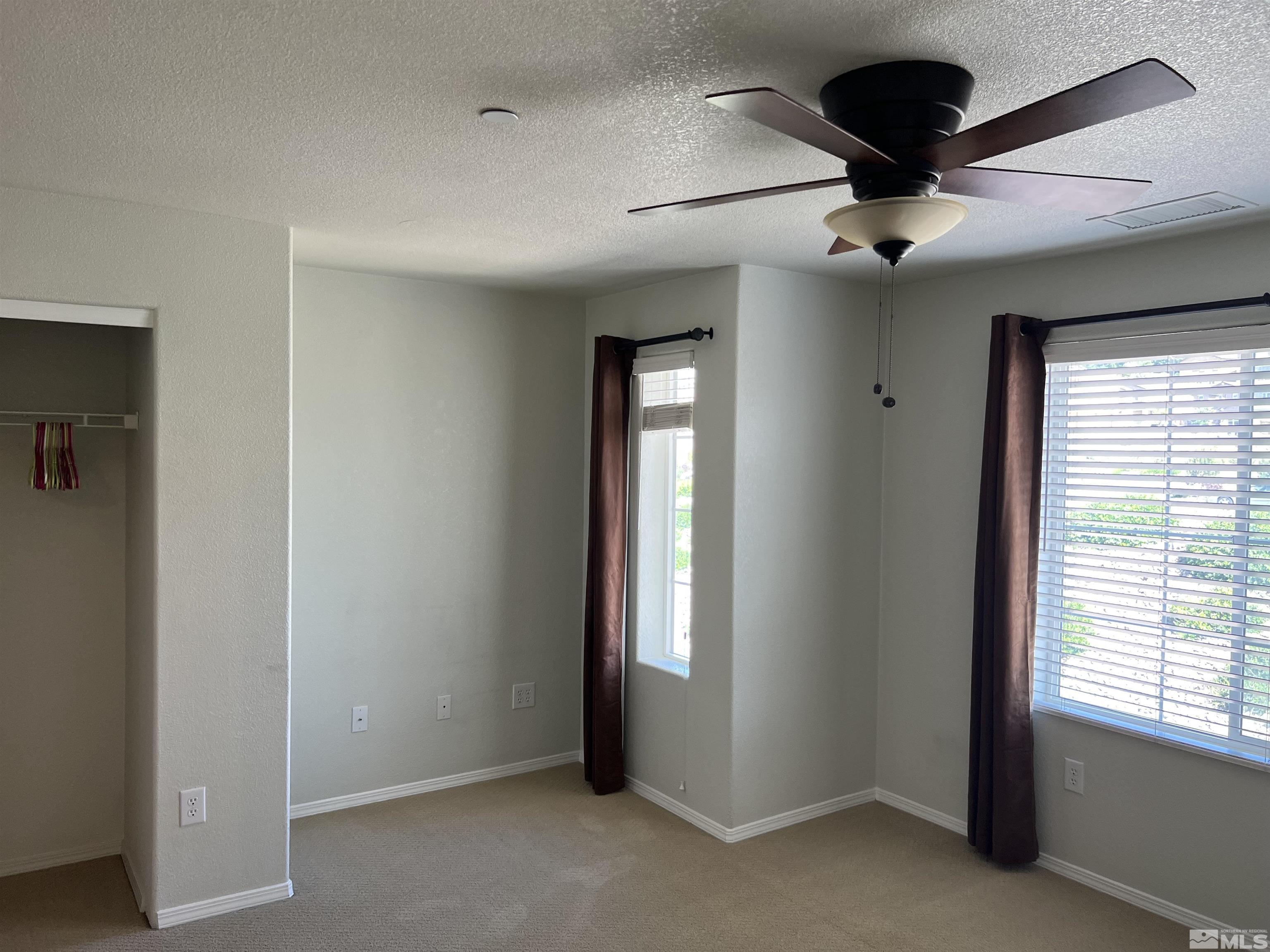 3078 Sterling Ridge Circle Sparks, NV 89431 - Photo 13 of 16 a view of an empty room and a window