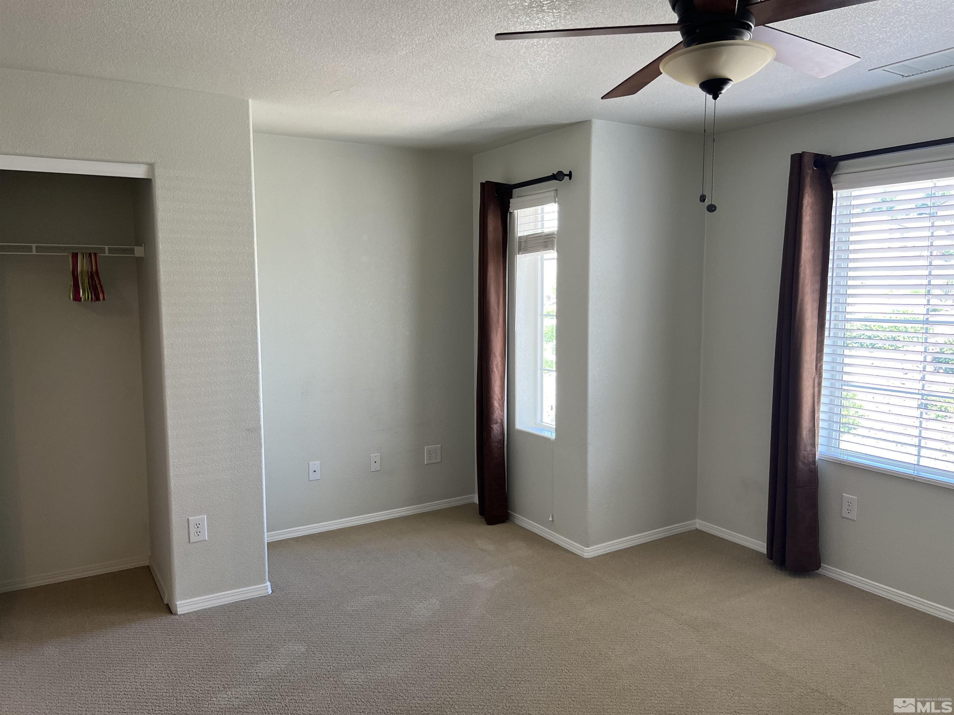 3078 Sterling Ridge Circle Sparks, NV 89431 - Photo 14 of 16 a view of an empty room with a window