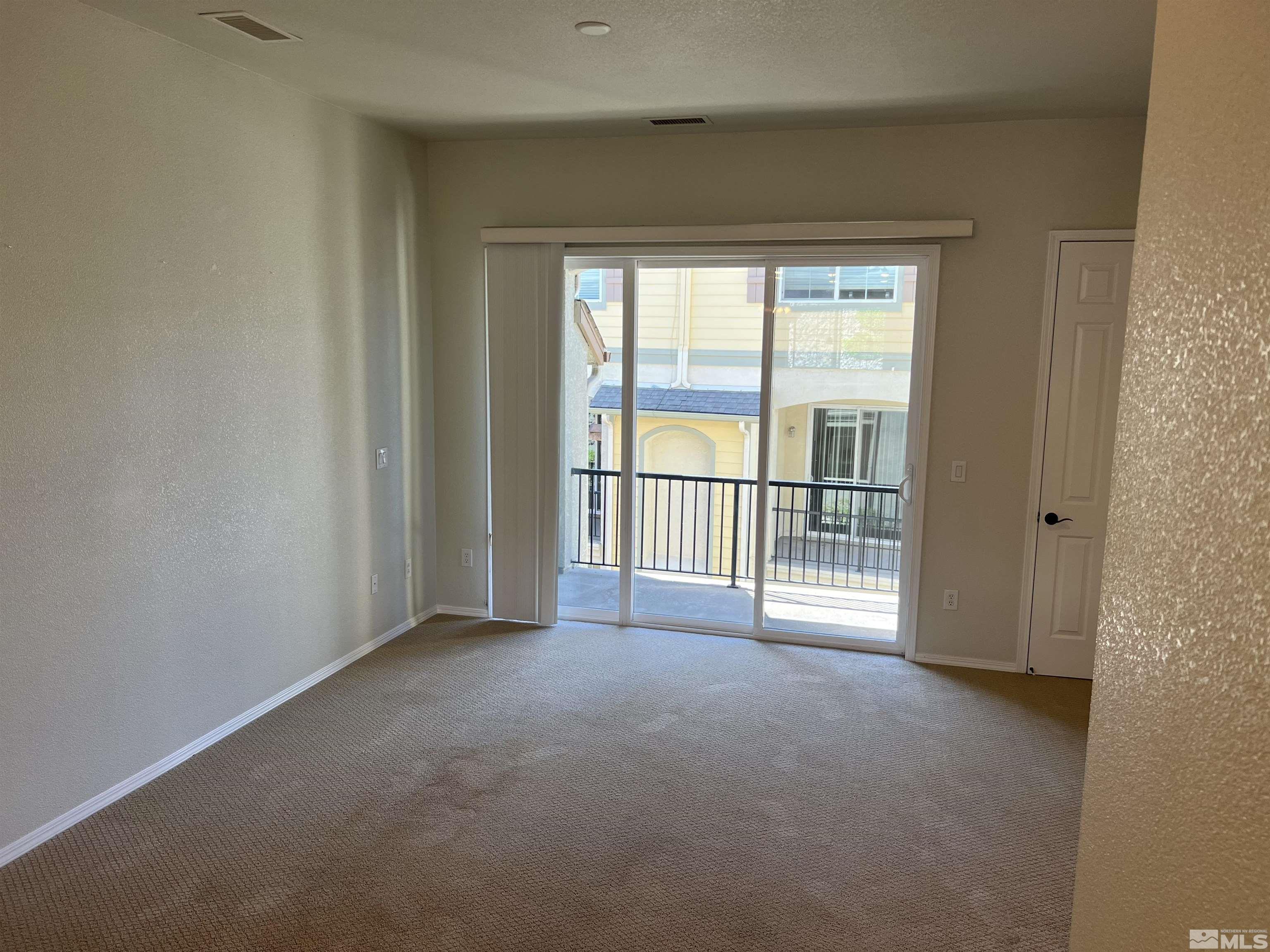 3078 Sterling Ridge Circle Sparks, NV 89431 - Photo 5 of 16 a view of a room with a large window