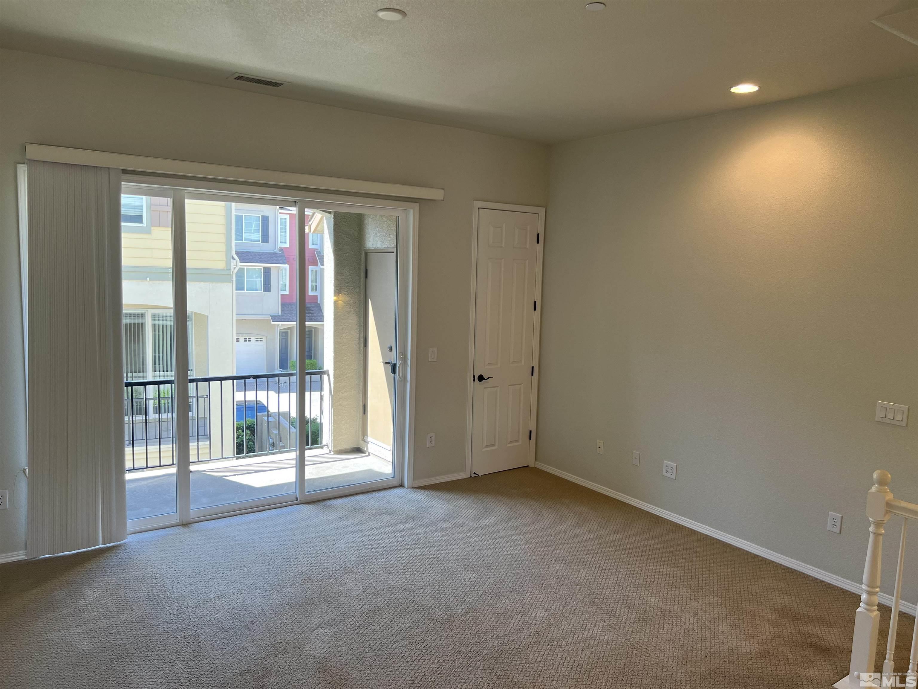 3078 Sterling Ridge Circle Sparks, NV 89431 - Photo 6 of 16 a view of an empty room with a window