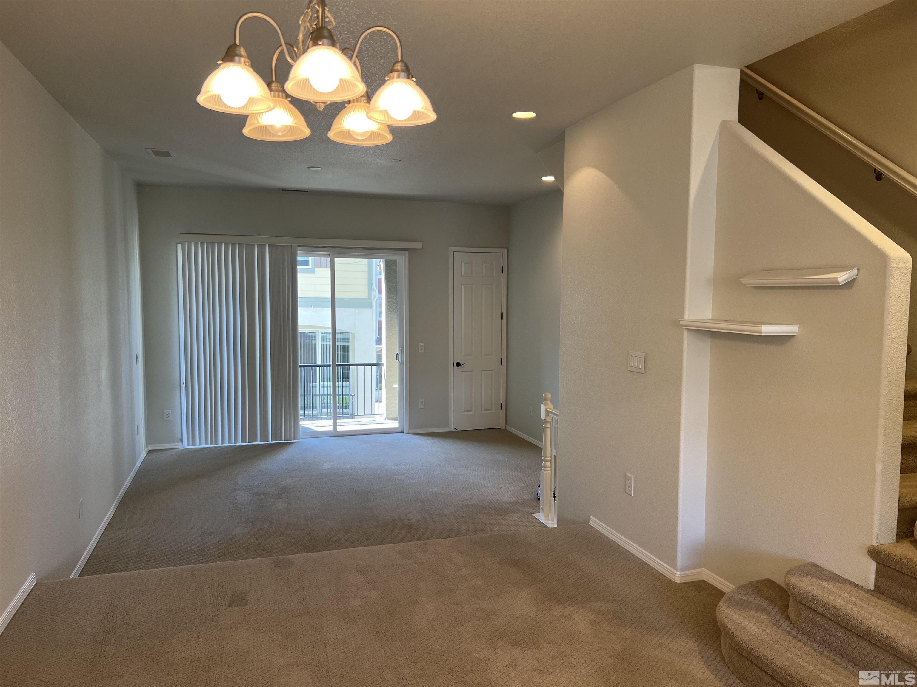 3078 Sterling Ridge Circle Sparks, NV 89431 - Photo 7 of 16 a view of an empty room with a window
