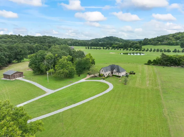 a view of a green field with clear sky