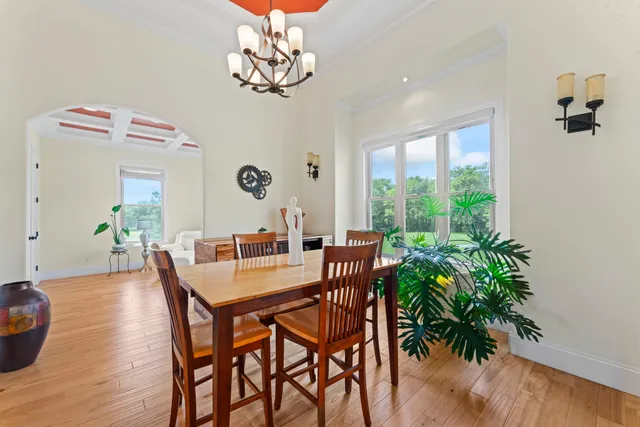 a kitchen with a stove a sink and a refrigerator