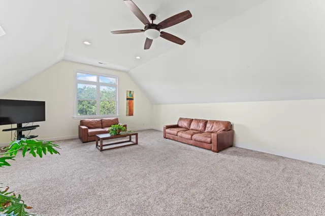 a bed room with a bed and a window