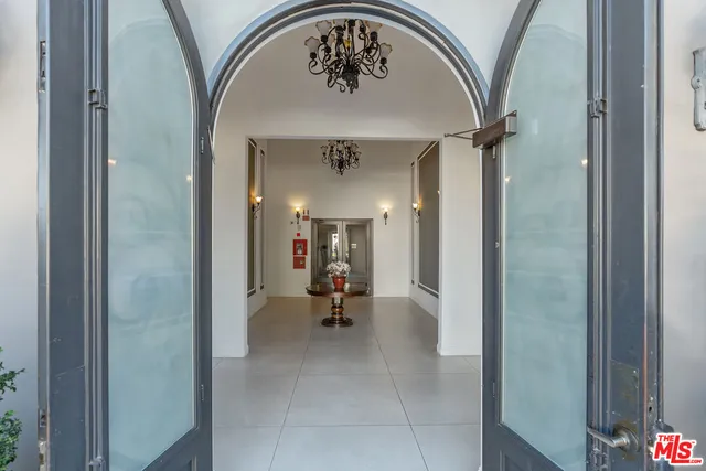 a view of a hallway with entryway