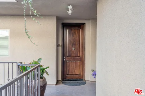 a view of a bathroom from a hallway