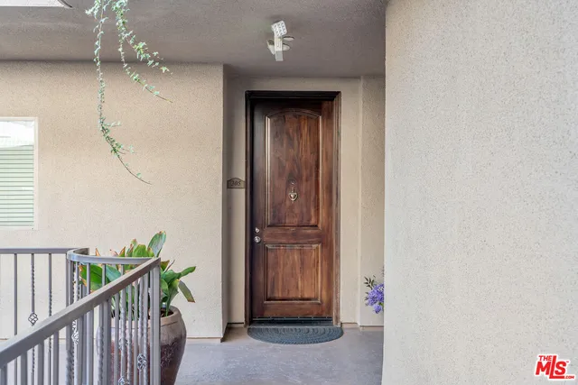 a view of a bathroom from a hallway