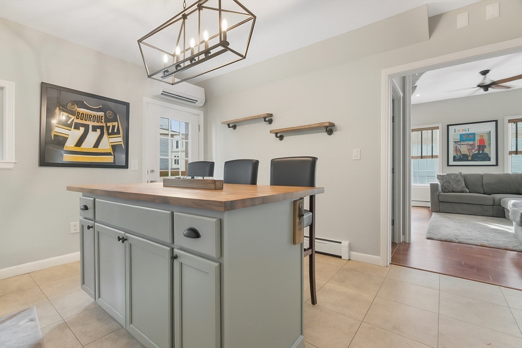 52 O Street, Unit 3 Boston, MA 02127 - Photo 5 of 20 a kitchen with cabinets and window