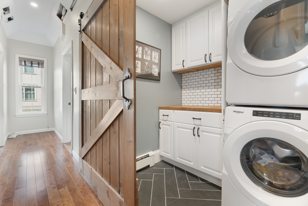 52 O Street, Unit 3 Boston, MA 02127 - Photo 10 of 20 a view of a hallway with washer and dryer