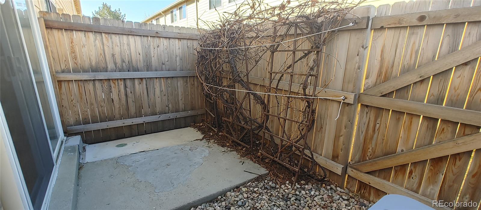8915 Field Street, Unit 113 Westminster, CO 80021 - Photo 11 of 38 a view of wooden fence