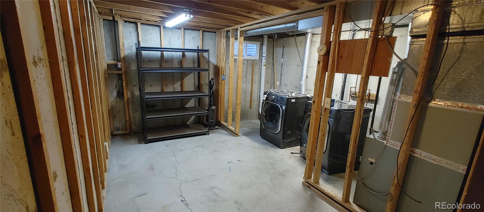 8915 Field Street, Unit 113 Westminster, CO 80021 - Photo 23 of 38 a view of walk in closet with clothes and shoes