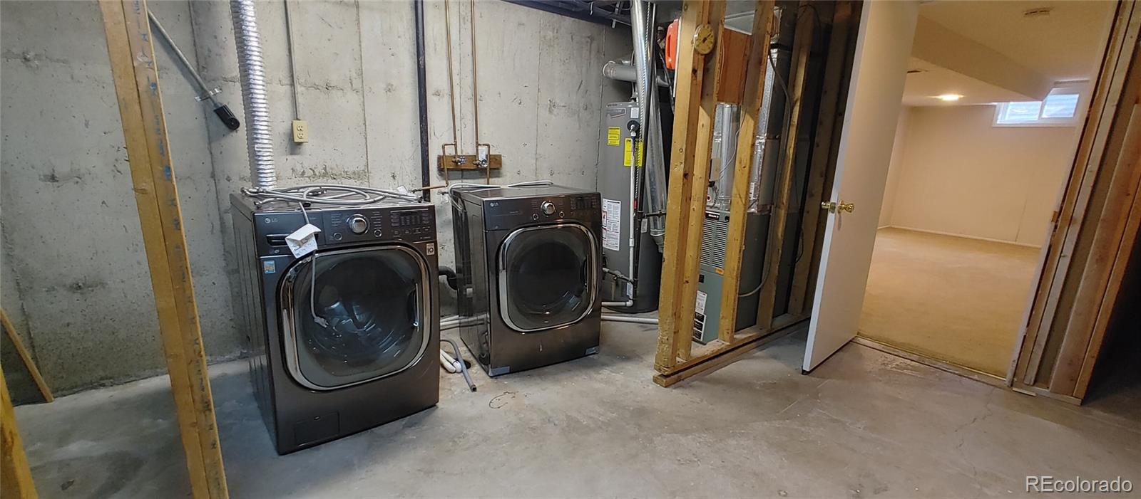 8915 Field Street, Unit 113 Westminster, CO 80021 - Photo 25 of 38 a utility room with dryer and washer