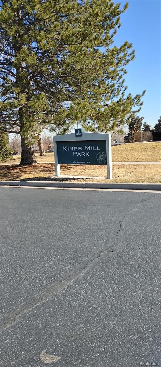 8915 Field Street, Unit 113 Westminster, CO 80021 - Photo 34 of 38 a view of room with wooden floor and windows