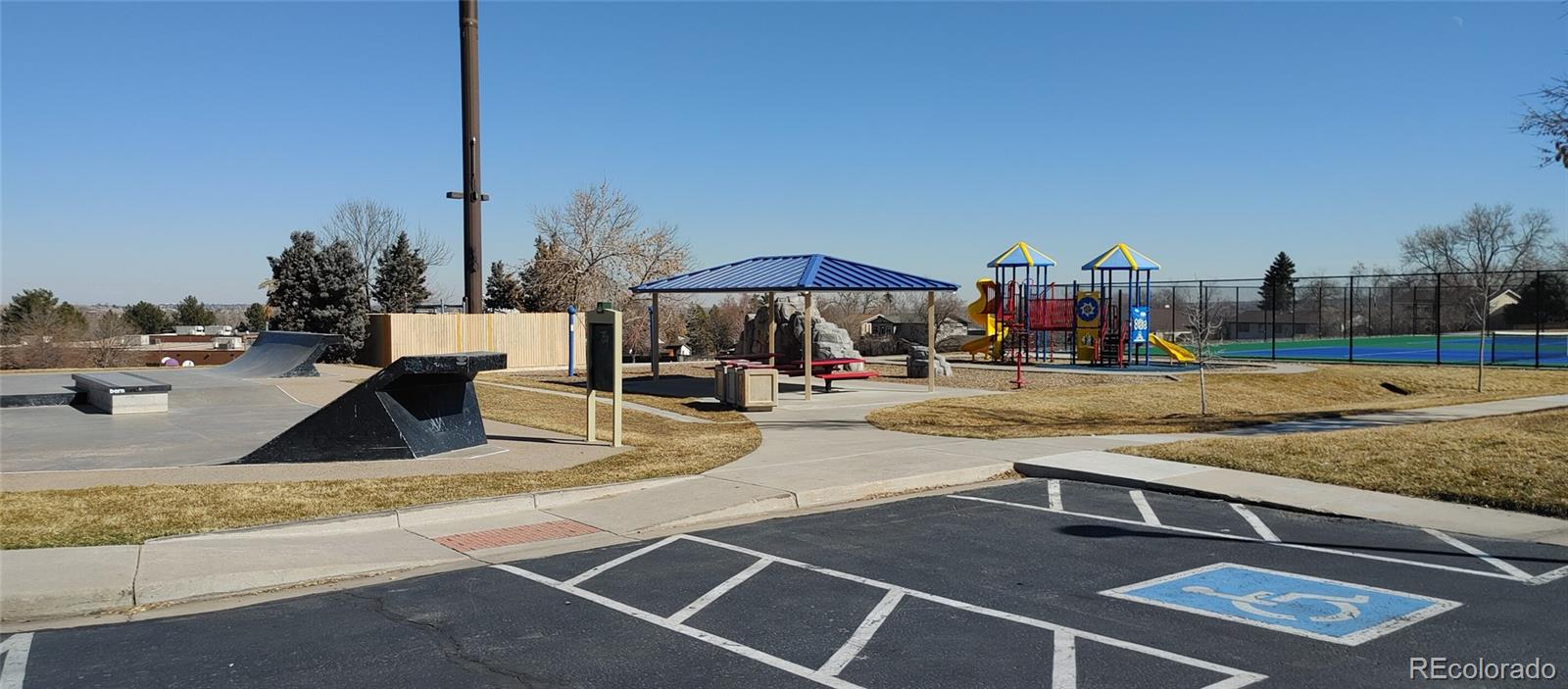 8915 Field Street, Unit 113 Westminster, CO 80021 - Photo 36 of 38 a view of a swimming pool with a lounge chairs