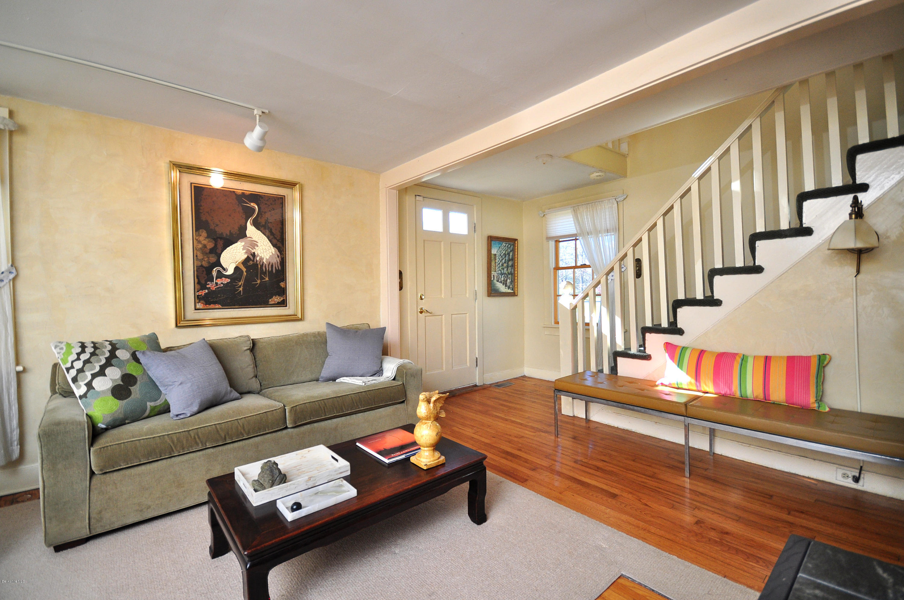 2 Cherry Hill Road Stockbridge, MA 01262 - Photo 22 of 43 a living room with furniture and a book shelf