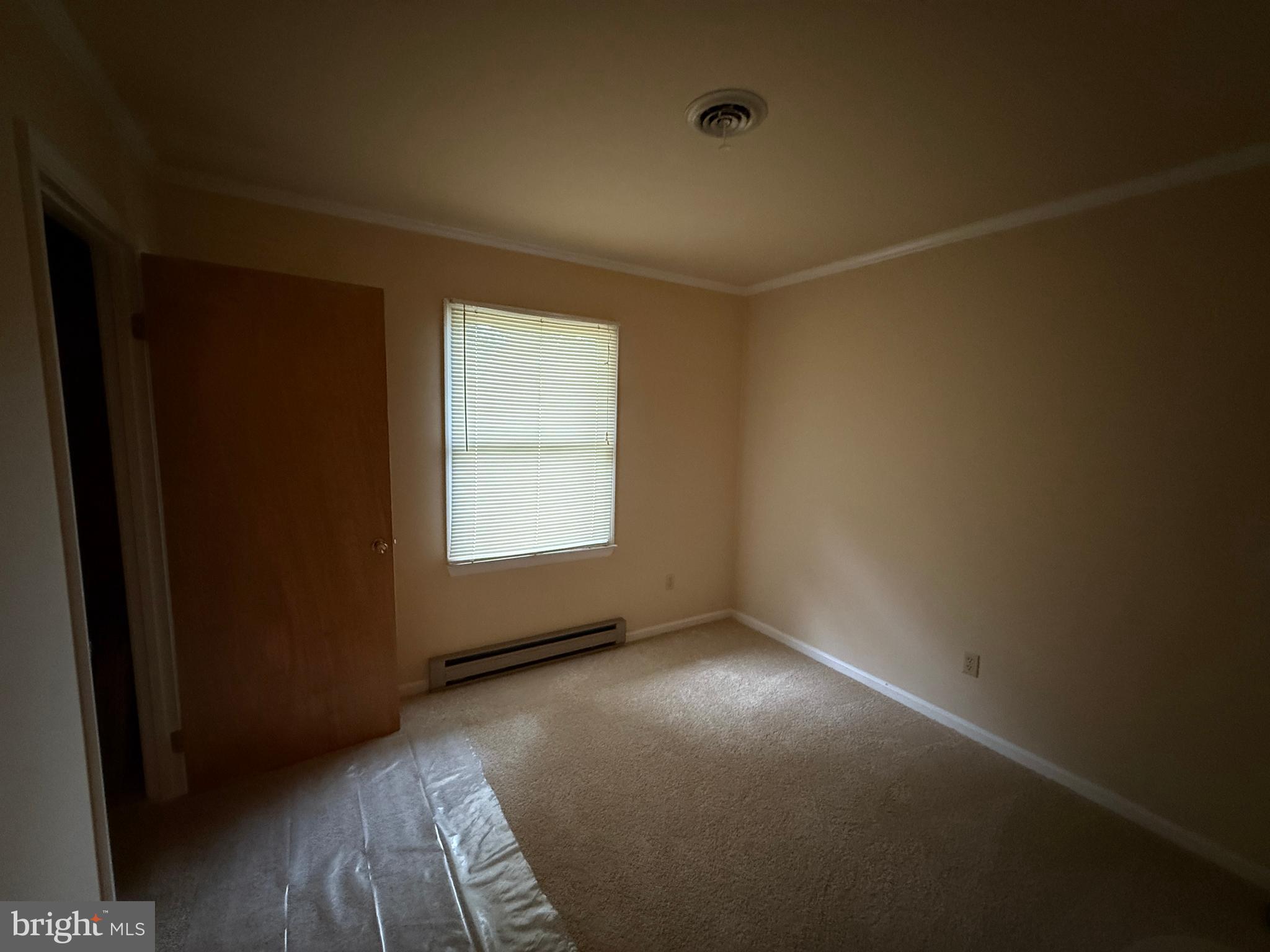 314 Kerr Avenue Denton, MD 21629 - Photo 15 of 19 an empty room with windows