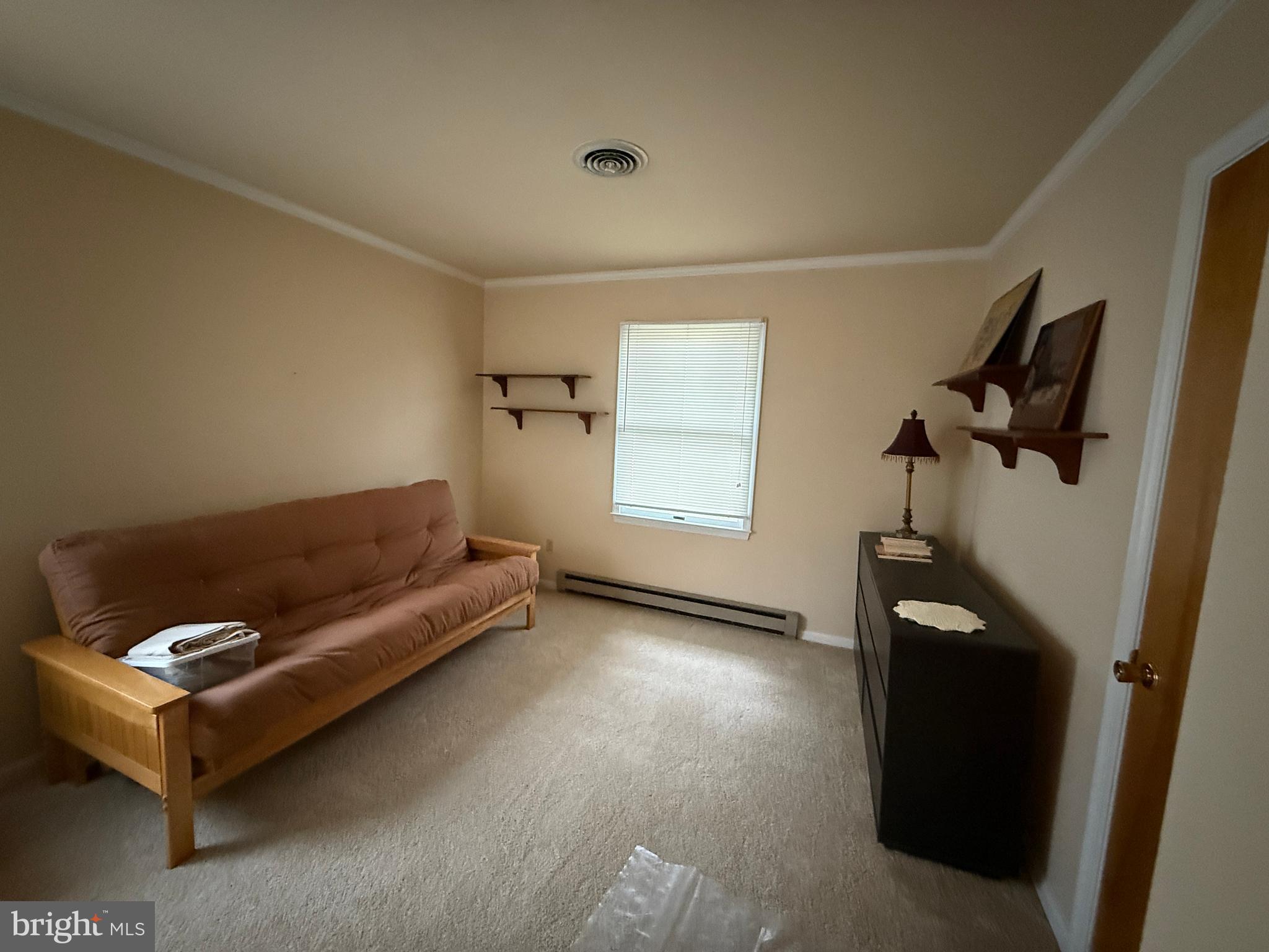 314 Kerr Avenue Denton, MD 21629 - Photo 16 of 19 a living room with furniture and a window