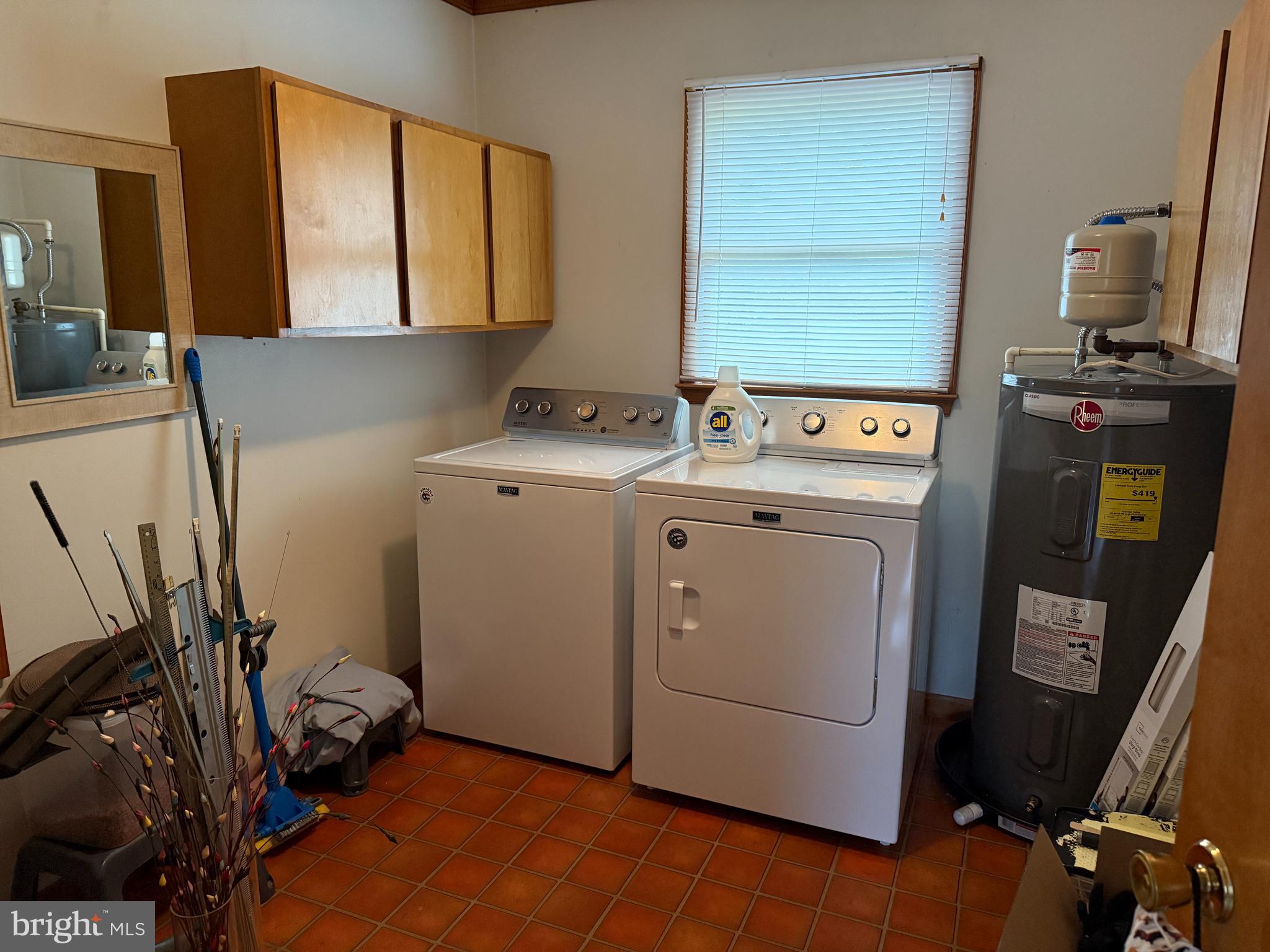 314 Kerr Avenue Denton, MD 21629 - Photo 9 of 19 a view of a storage & utility room with two washing machine