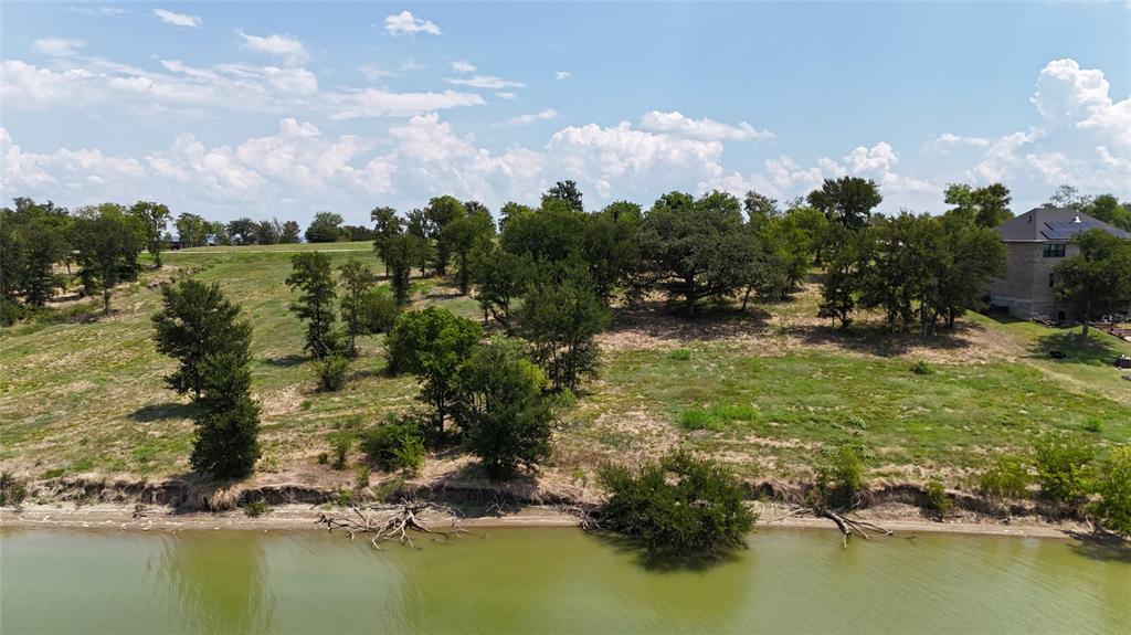 Lot 32 Opal Drive Corsicana, TX 75109 - Photo 11 of 40 a view of a lake with houses