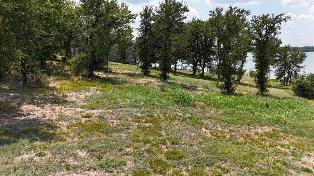 Lot 32 Opal Drive Corsicana, TX 75109 - Photo 30 of 40 a view of outdoor space with a garden and trees