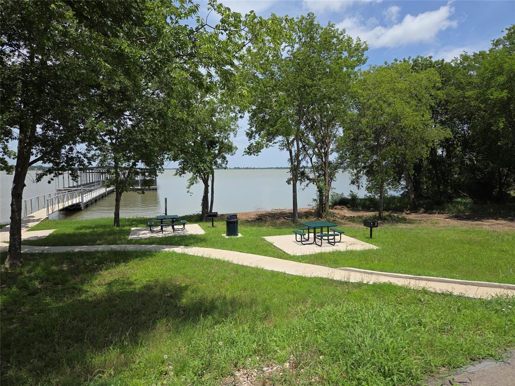 Lot 32 Opal Drive Corsicana, TX 75109 - Photo 38 of 40 a view of a playground with a yard and plants