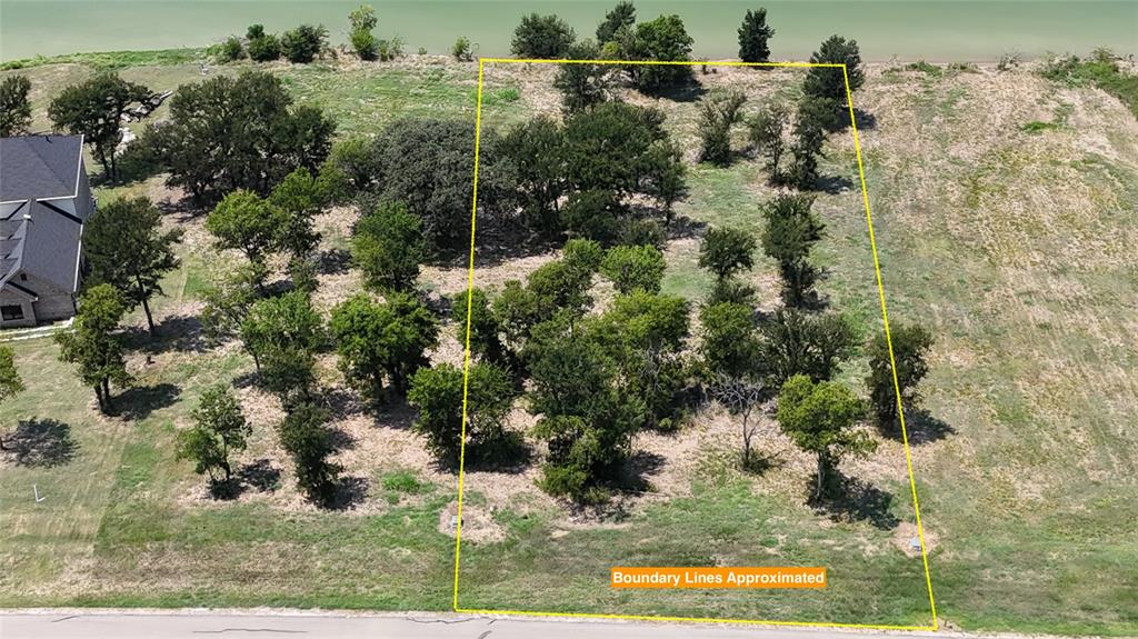 Lot 32 Opal Drive Corsicana, TX 75109 - Photo 5 of 40 an aerial view of a houses with yard