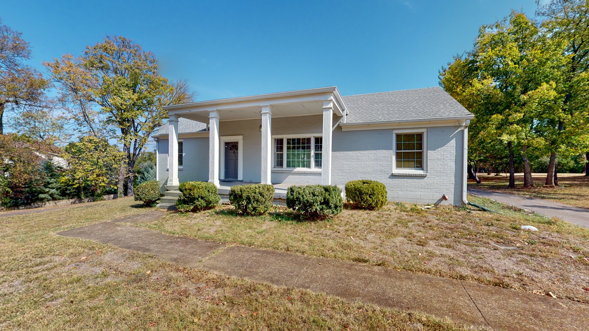 774 Elysian Fields Road Nashville, TN 37204 - Photo 12 of 43 a front view of a house with a yard